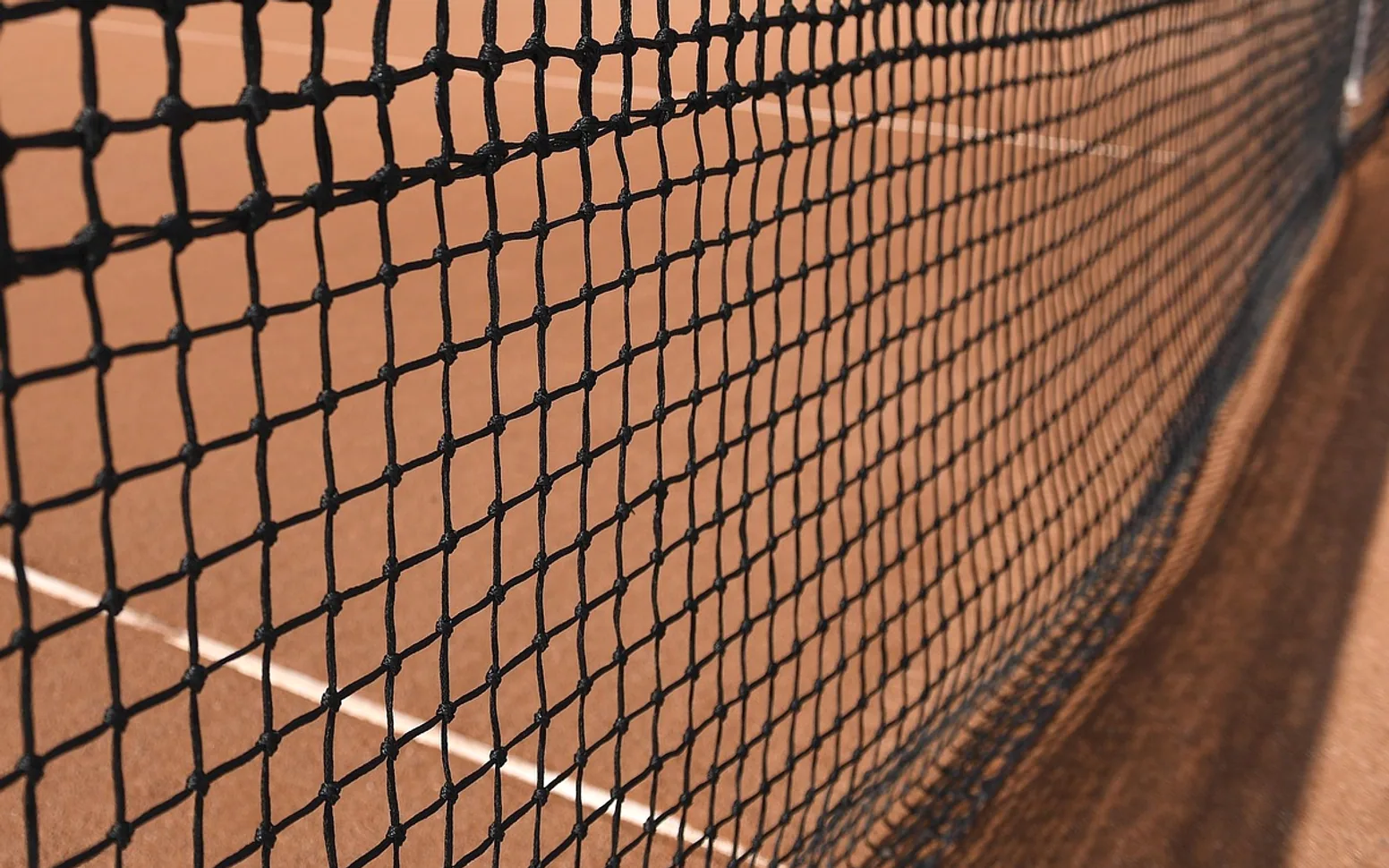 Tennis net, tennis court and clay court