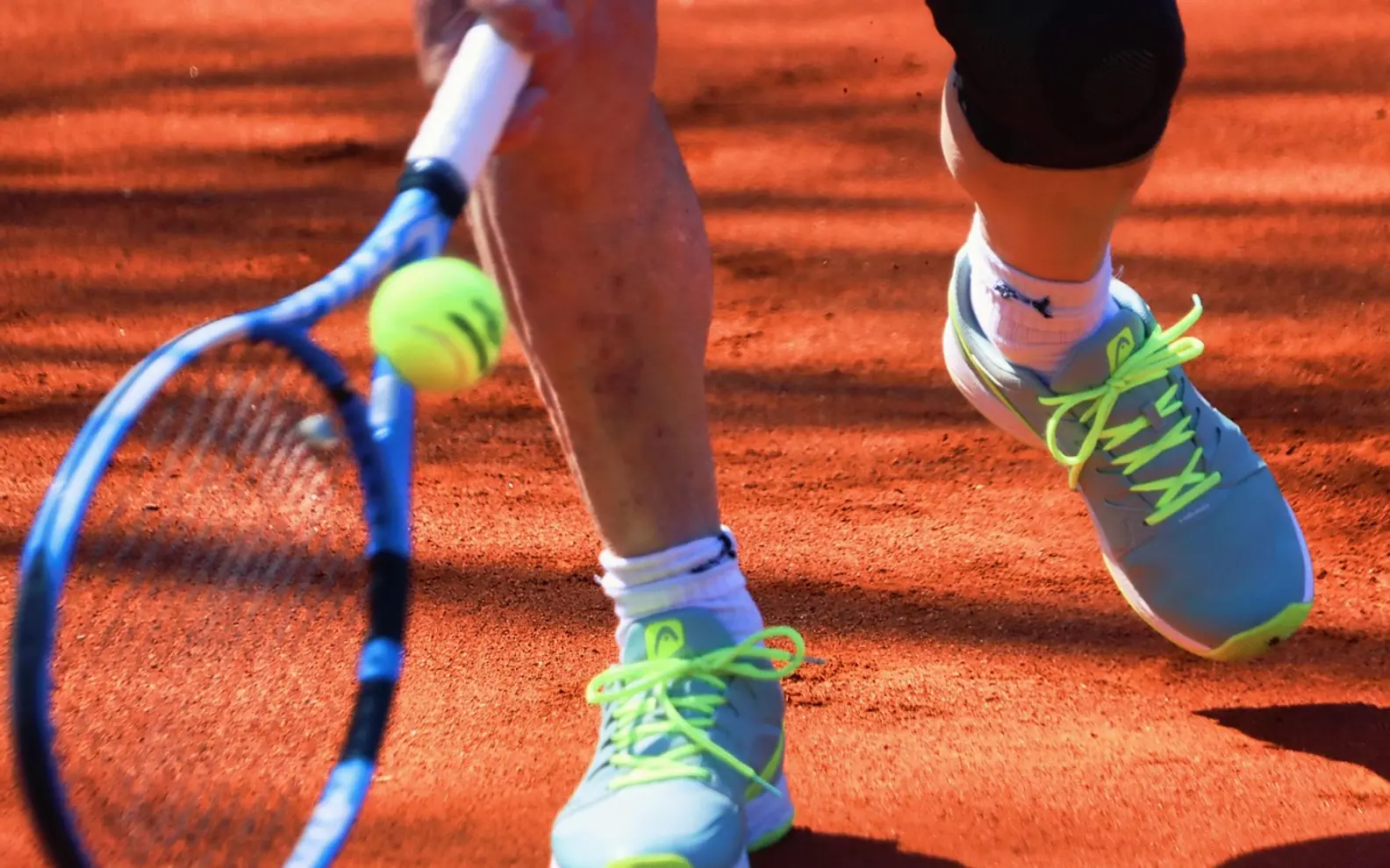Tennis ball, tennis player and tennis racket